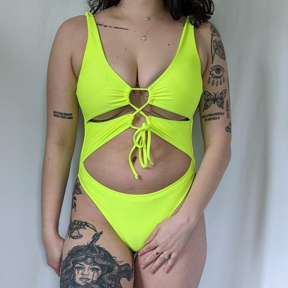 Neon yellow strappy one piece thong bathing suit